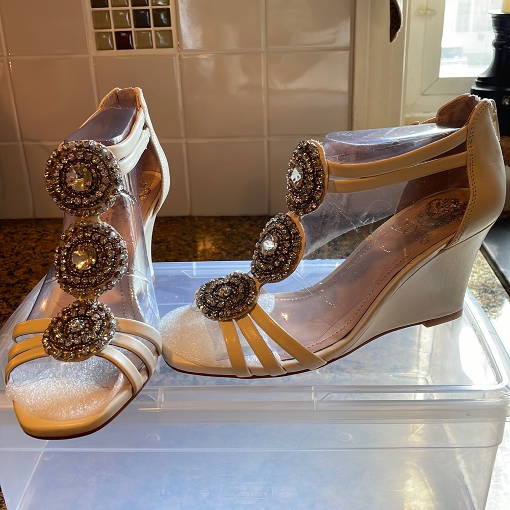 Vince Camuto dressy wedge sandals in cream with jewel appliqués on front.